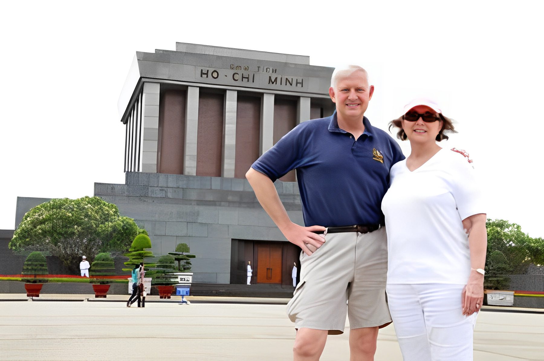 Couple posing in front of Ho Chi Minh.