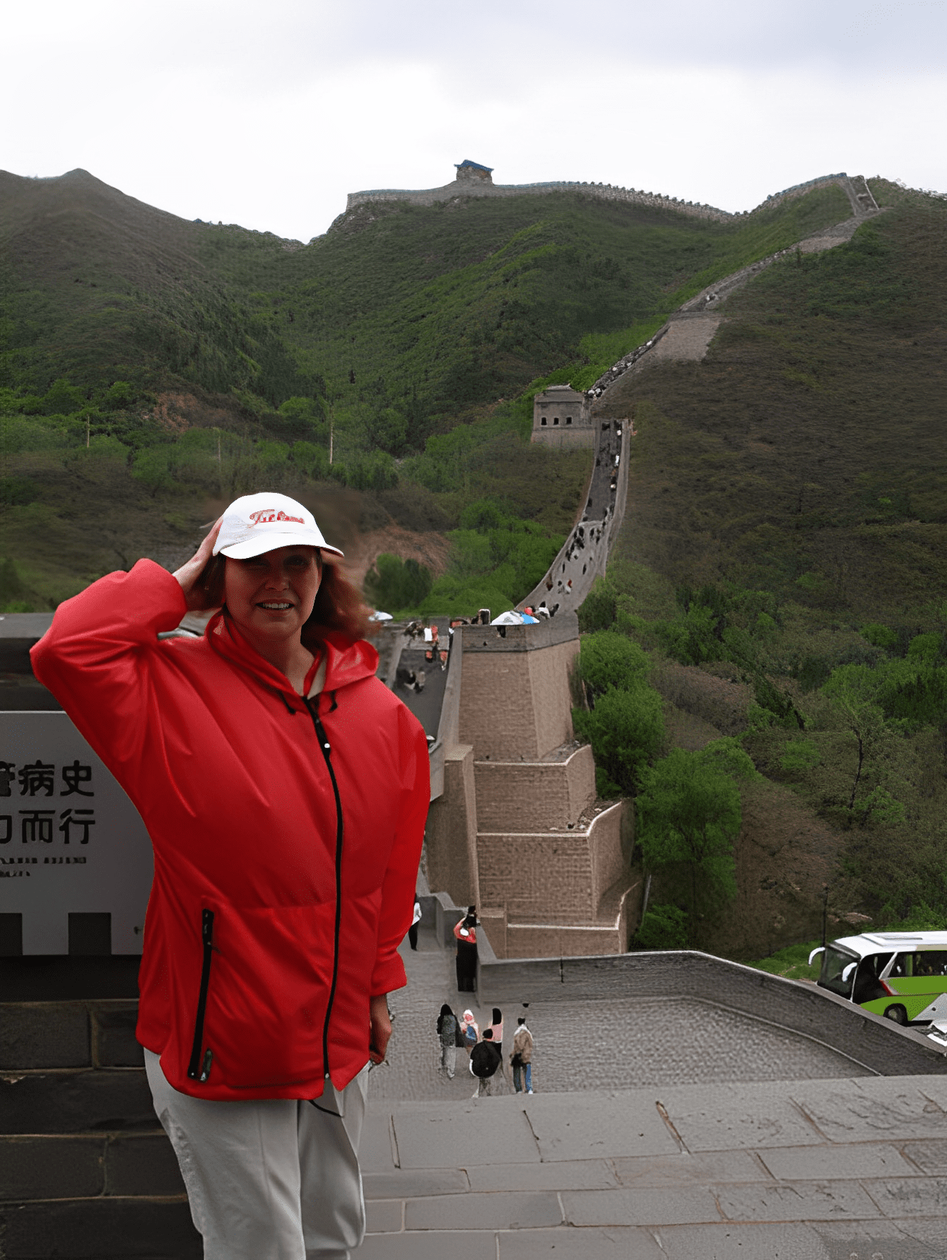 Person in red jacket at Great Wall.