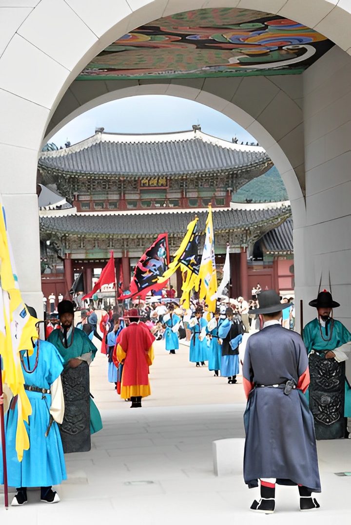 Traditional Korean palace guards in colorful attire.