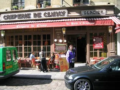 People outside Creperie de Cluny restaurant.
